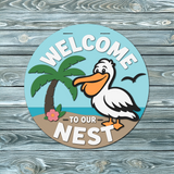 Welcome to our Nest Pelican Door Hanger SVG